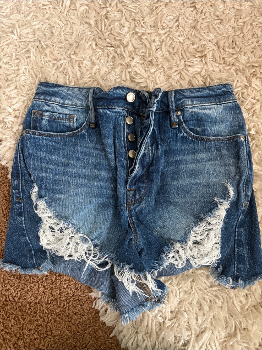 Good American Distressed Blue Button-Fly Jean Shorts
